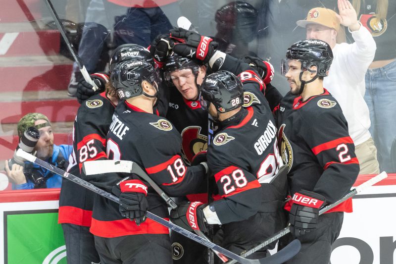 Jan 26, 2025; Ottawa, Ontario, CAN; The Ottawa Senators celebrate a goal scored by left wing Brady Tkachuk (7) in the third period against Utah at the Canadian Tire Centre. Mandatory Credit: Marc DesRosiers-Imagn Images