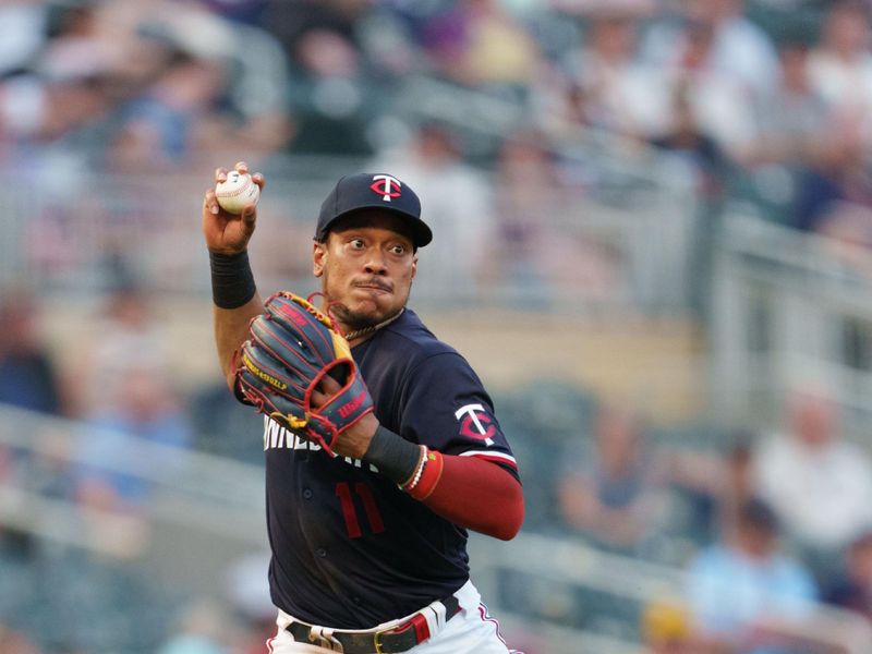 Aug 19, 2023; Minneapolis, Minnesota, USA; Minnesota Twins third baseman Jorge Polanco (11) throws to first base, Pittsburgh Pirates shortstop Liover Peguero (not pictured) would be safe at Target Field. Mandatory Credit: Matt Blewett-USA TODAY Sports