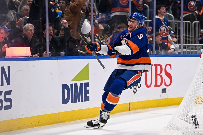 Nov 27, 2024; Elmont, New York, USA;  New York Islanders center Brock Nelson (29) celebrates his goal against the Boston Bruins during the second period at UBS Arena. Mandatory Credit: Dennis Schneidler-Imagn Images