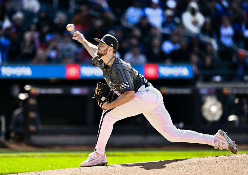 May 11, 2024; New York City, New York, USA; New York Mets pitcher Christian Scott (45) pitches against the Atlanta Braves during the first inning at Citi Field. Mandatory Credit: John Jones-USA TODAY Sports