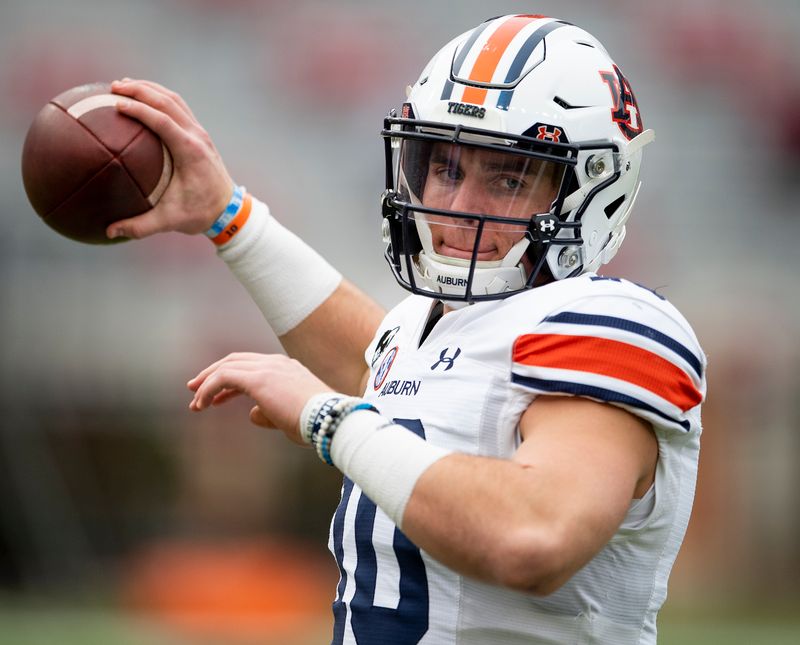 Nov 28, 2020; Tuscaloosa, Alabama, USA;  Auburn quarterback Bo Nix (10) warms up at Bryant-Denny Stadium before the Iron Bowl. Mandatory Credit: Mickey Welsh/The Montgomery Advertiser via USA TODAY Sports