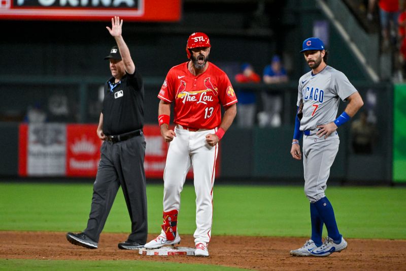 May 25, 2024; St. Louis, Missouri, USA;  St. Louis Cardinals designated hitter Matt Carpenter (13) reacts after hitting a game tying one run single against the Chicago Cubs during the eighth inning at Busch Stadium. Mandatory Credit: Jeff Curry-USA TODAY Sports