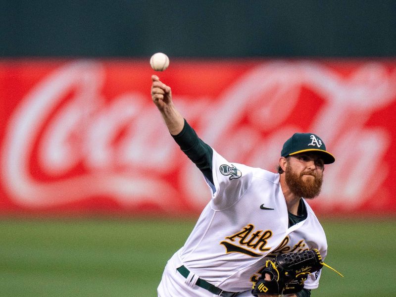 Sep 19, 2023; Oakland, California, USA; Oakland Athletics starting pitcher Paul Blackburn (58) delivers a pitch against the Seattle Mariners during the first inning at Oakland-Alameda County Coliseum. Mandatory Credit: Neville E. Guard-USA TODAY Sports