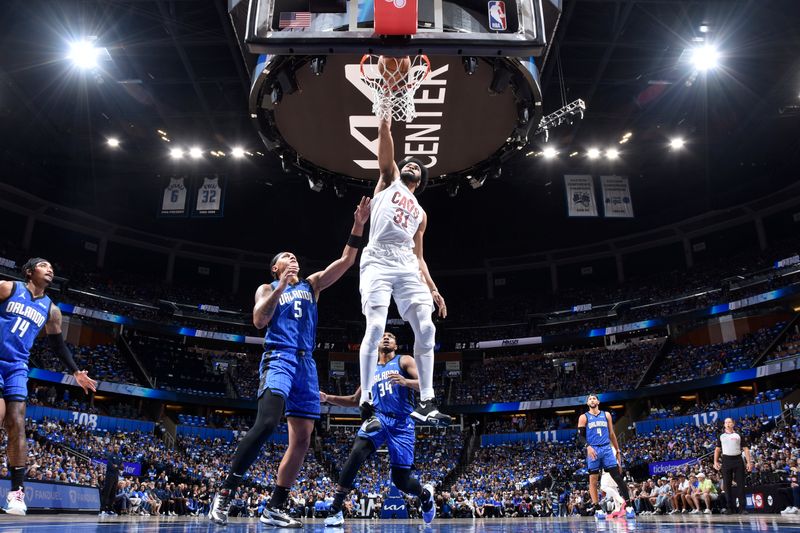 ORLANDO, FL - APRIL 27: Jarrett Allen #31 of the Cleveland Cavaliers dunks the ball during the game against the Orlando Magic during Round 1 Game 4 of the 2024 NBA Playoffs on April 27, 2024 at the Kia Center in Orlando, Florida. NOTE TO USER: User expressly acknowledges and agrees that, by downloading and or using this photograph, User is consenting to the terms and conditions of the Getty Images License Agreement. Mandatory Copyright Notice: Copyright 2024 NBAE (Photo by Fernando Medina/NBAE via Getty Images)