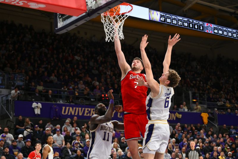 Jan 11, 2026; Seattle, Washington, USA; Ohio State Buckeyes center Ivan Njegovan (7) shoots the ball while guarded by Washington Huskies forward Hannes Steinbach (6) during the second half at Alaska Airlines Arena at Hec Edmundson Pavilion. Mandatory Credit: Steven Bisig-Imagn Images
