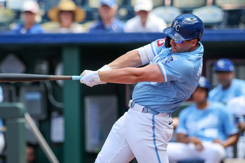 Jun 26, 2024; Kansas City, Missouri, USA; Kansas City Royals first base Vinnie Pasquantino (9) hits a double against the Miami Marlins during the sixth inning at Kauffman Stadium. Mandatory Credit: William Purnell-USA TODAY Sports