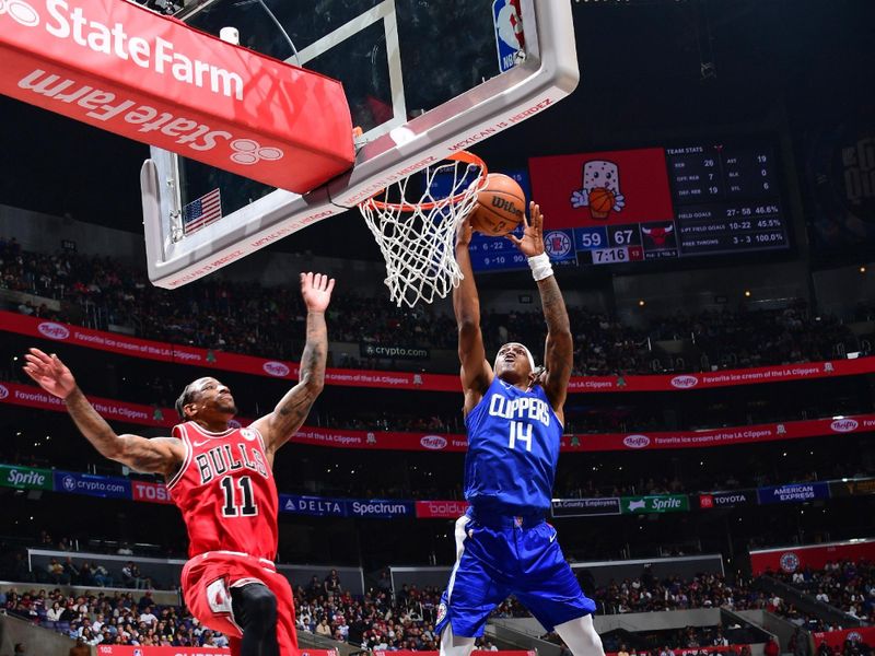 LOS ANGELES, CA - MARCH 9: Terance Mann #14 of the LA Clippers shoots the ball during the game against the Chicago Bulls on March 9, 2024 at Crypto.Com Arena in Los Angeles, California. NOTE TO USER: User expressly acknowledges and agrees that, by downloading and/or using this Photograph, user is consenting to the terms and conditions of the Getty Images License Agreement. Mandatory Copyright Notice: Copyright 2024 NBAE (Photo by Adam Pantozzi/NBAE via Getty Images)