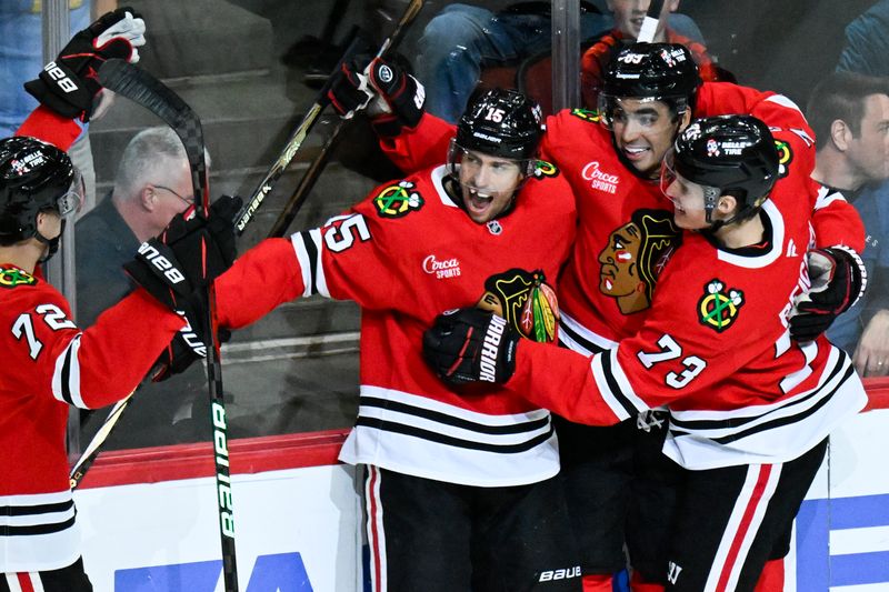 Oct 19, 2024; Chicago, Illinois, USA;  Chicago Blackhawks center Craig Smith (15) celebrates with teammates after scoring a goal against the Buffalo Sabres during the second period at the United Center. Mandatory Credit: Matt Marton-Imagn Images