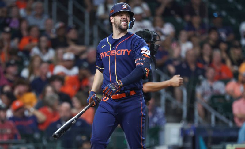 Sep 11, 2023; Houston, Texas, USA; Houston Astros center fielder Chas McCormick (20) reacts after striking out during the eighth inning against the Oakland Athletics at Minute Maid Park. Mandatory Credit: Troy Taormina-USA TODAY Sports