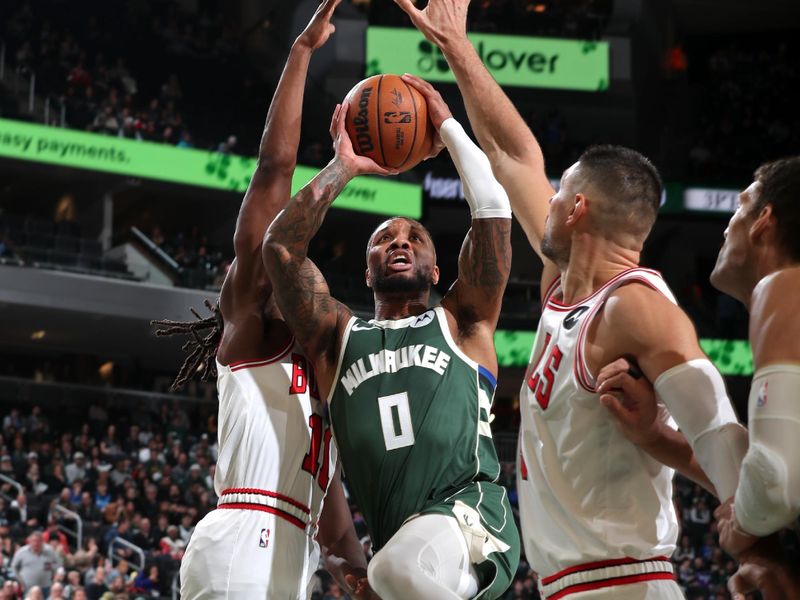 MILWAUKEE, WI - NOVEMBER 20: Damian Lillard #0 of the Milwaukee Bucks drives to the basket during the game against the Chicago Bulls on November 20, 2024 at the Fiserv Forum Center in Milwaukee, Wisconsin. NOTE TO USER: User expressly acknowledges and agrees that, by downloading and or using this Photograph, user is consenting to the terms and conditions of the Getty Images License Agreement. Mandatory Copyright Notice: Copyright 2024 NBAE (Photo by Gary Dineen/NBAE via Getty Images).