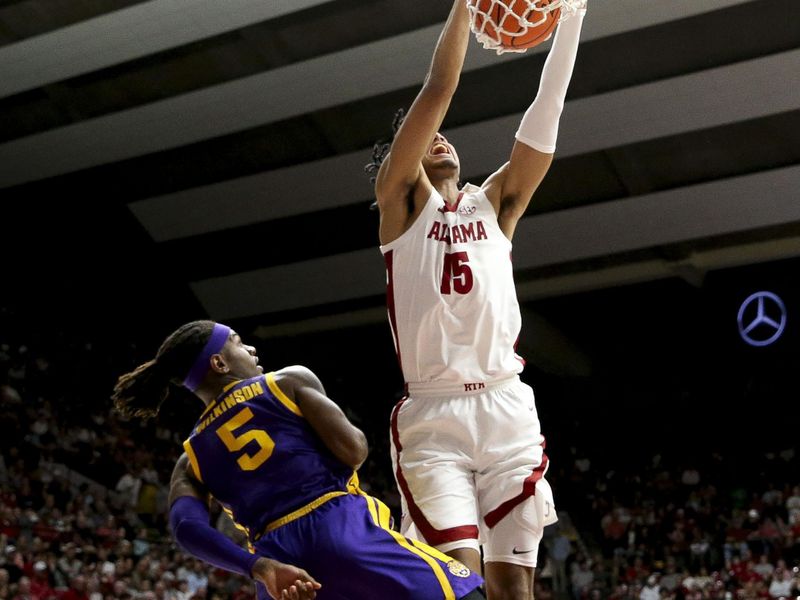 Jan 27, 2024; Tuscaloosa, Alabama, USA; Alabama forward Jarin Stevenson (15) dunks over LSU forward Mwani Wilkinson (5) at Coleman Coliseum. Mandatory Credit: Gary Cosby Jr.-USA TODAY Sports