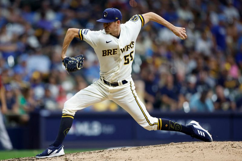 Oct 4, 2023; Milwaukee, Wisconsin, USA; Milwaukee Brewers relief pitcher Hoby Milner (55) pitches in the seventh inning against the Arizona Diamondbacks during game two of the Wildcard series for the 2023 MLB playoffs at American Family Field. Mandatory Credit: Kamil Krzaczynski-USA TODAY Sports