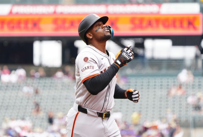 Jul 21, 2024; Denver, Colorado, USA; San Francisco Giants designated hitter Jorge Soler (2) celebrates his solo home run in the first inning against the Colorado Rockies at Coors Field. Mandatory Credit: Ron Chenoy-USA TODAY Sports