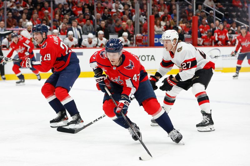 Feb 26, 2024; Washington, District of Columbia, USA; Washington Capitals left wing Beck Malenstyn (47) skates with the puck as Ottawa Senators left wing Parker Kelly (27) chases in the first period at Capital One Arena. Mandatory Credit: Geoff Burke-USA TODAY Sports