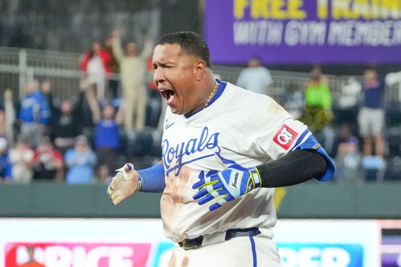 Apr 9, 2024; Kansas City, Missouri, USA; Kansas City Royals catcher Salvador Perez (13) celebrates after his one run walkout single) for the win over the Houston Astros at Kauffman Stadium. Mandatory Credit: Denny Medley-USA TODAY Sports