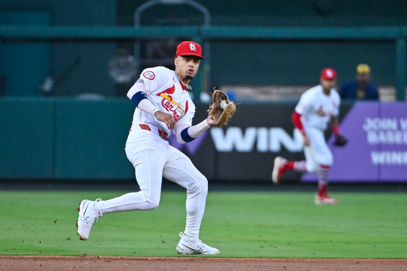 Aug 21, 2024; St. Louis, Missouri, USA;  St. Louis Cardinals shortstop Masyn Winn (0) catches a line drive against the Milwaukee Brewers during the second inning at Busch Stadium. Mandatory Credit: Jeff Curry-USA TODAY Sports