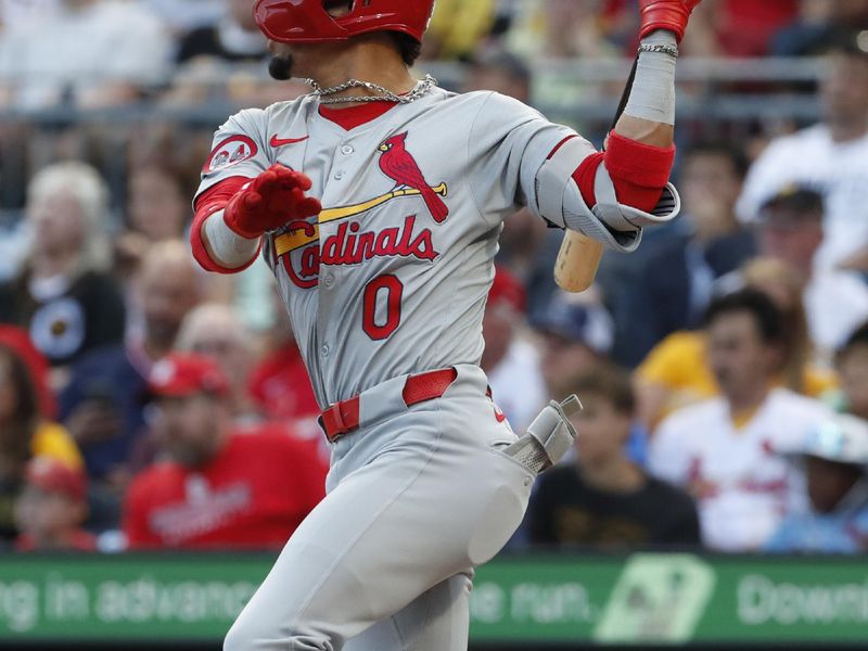 Jul 2, 2024; Pittsburgh, Pennsylvania, USA;  St. Louis Cardinals shortstop Masyn Winn (0) hits a double against the Pittsburgh Pirates during the third inning at PNC Park. Mandatory Credit: Charles LeClaire-USA TODAY Sports