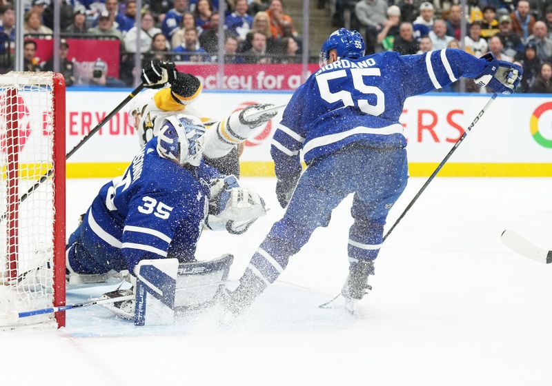 Apr 8, 2024; Toronto, Ontario, CAN; Pittsburgh Penguins right wing Bryan Rust (17) charges the net as Toronto Maple Leafs defenseman Mark Giordano (55) defends during the second period at Scotiabank Arena. Mandatory Credit: Nick Turchiaro-USA TODAY Sports