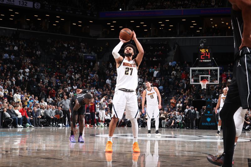 BROOKLYN, NY - OCTOBER 29: Jamal Murray #27 of the Denver Nuggets shoots a free throw during the game against the Brooklyn Nets on October 29, 2024 at Barclays Center in Brooklyn, New York. NOTE TO USER: User expressly acknowledges and agrees that, by downloading and or using this Photograph, user is consenting to the terms and conditions of the Getty Images License Agreement. Mandatory Copyright Notice: Copyright 2024 NBAE (Photo by Nathaniel S. Butler/NBAE via Getty Images)