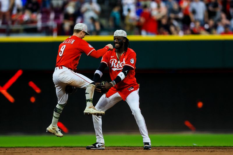 May 17, 2025; Cincinnati, Ohio, USA; Cincinnati Reds second baseman Matt McLain (9) and shortstop Elly De La Cruz (44) react after the victory over the Cleveland Guardians at Great American Ball Park. Mandatory Credit: Katie Stratman-Imagn Images