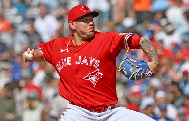 Jul 1, 2024; Toronto, Ontario, CAN;  Toronto Blue Jays starting pitcher Yariel Rodriguez (29) delivers a pitch against the Houston Astros in the fourth inning at Rogers Centre. Mandatory Credit: Dan Hamilton-USA TODAY Sports