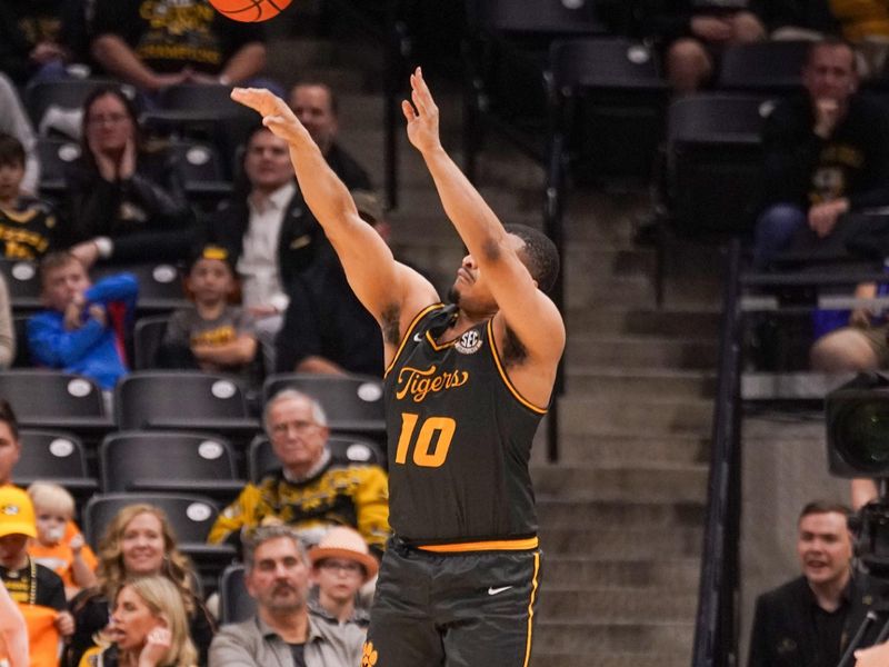 Feb 20, 2024; Columbia, Missouri, USA; Missouri Tigers guard Nick Honor (10) shots a three point attempt against the Tennessee Volunteers during the second half at Mizzou Arena. Mandatory Credit: Denny Medley-USA TODAY Sports