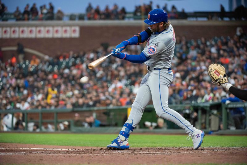 Apr 23, 2024; San Francisco, California, USA;  New York Mets second base Jeff McNeil (1) hits a single during the fifth inning against the San Francisco Giants at Oracle Park. Mandatory Credit: Ed Szczepanski-USA TODAY Sports