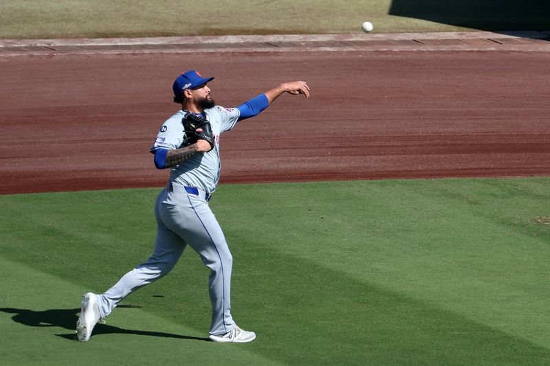 Oct 14, 2024; Los Angeles, California, USA; New York Mets pitcher Sean Manaea (59) practices before game two of the NLCS for the 2024 MLB Playoffs at Dodger Stadium. Mandatory Credit: Kiyoshi Mio-Imagn Images