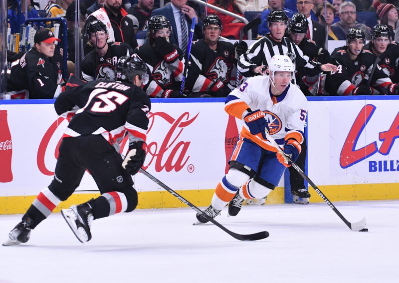 Oct 21, 2023; Buffalo, New York, USA; New York Islanders center Casey Cizikas (53) tries to get the puck past Buffalo Sabres defenseman Connor Clifton (75) in the first period at KeyBank Center. Mandatory Credit: Mark Konezny-USA TODAY Sports