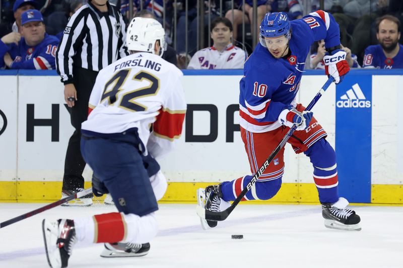 May 22, 2024; New York, New York, USA; New York Rangers left wing Artemi Panarin (10) plays the puck against Florida Panthers defenseman Gustav Forsling (42) during the first period of game one of the Eastern Conference Final of the 2024 Stanley Cup Playoffs at Madison Square Garden. Mandatory Credit: Brad Penner-USA TODAY Sports