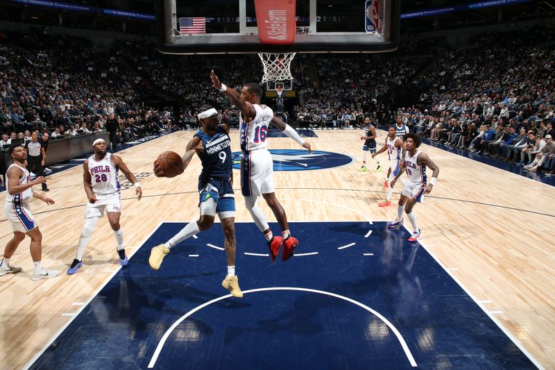 MINNEAPOLIS, MN -  MARCH 4: Nickeil Alexander-Walker #9 of the Minnesota Timberwolves drives to the basket during the game against the Philadelphia 76ers on March 4, 2025 at Target Center in Minneapolis, Minnesota. NOTE TO USER: User expressly acknowledges and agrees that, by downloading and or using this Photograph, user is consenting to the terms and conditions of the Getty Images License Agreement. Mandatory Copyright Notice: Copyright 2025 NBAE (Photo by David Sherman/NBAE via Getty Images)