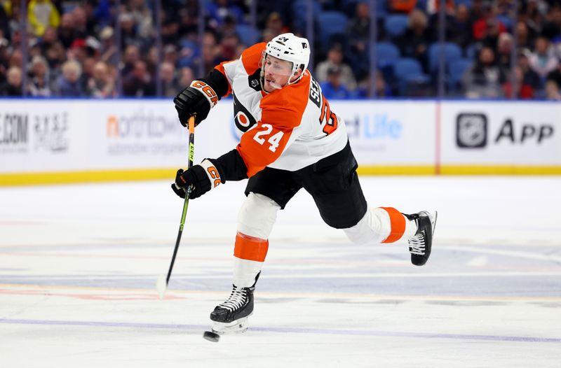 Nov 3, 2023; Buffalo, New York, USA;  Philadelphia Flyers defenseman Nick Seeler (24) takes a shot on goal during the third period against the Buffalo Sabres at KeyBank Center. Mandatory Credit: Timothy T. Ludwig-USA TODAY Sports