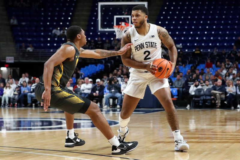 Jan 1, 2023; University Park, Pennsylvania, USA; Penn State Nittany Lions guard/forward Myles Dread (2) holds the ball as Iowa Hawkeyes guard Tony Perkins (11) defends during the first half at Bryce Jordan Center. Mandatory Credit: Matthew OHaren-USA TODAY Sports