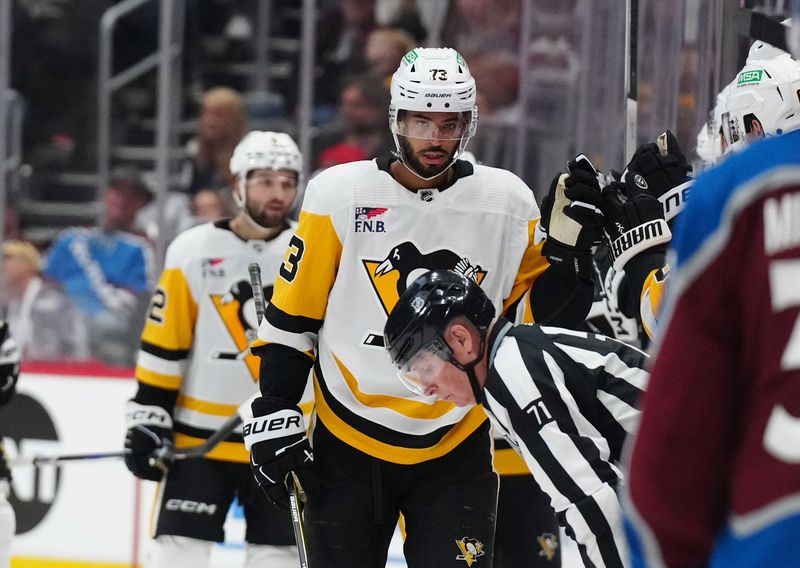 Mar 24, 2024; Denver, Colorado, USA; Pittsburgh Penguins defenseman Pierre-Olivier Joseph (73) celebrates his goal score in the second period against the Colorado Avalanche at Ball Arena. Mandatory Credit: Ron Chenoy-USA TODAY Sports