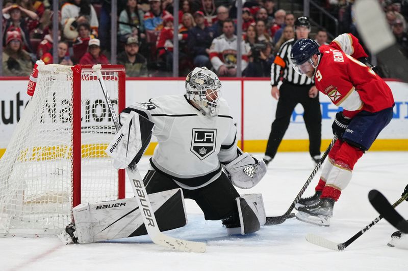 Jan 11, 2024; Sunrise, Florida, USA; Florida Panthers center Sam Bennett (9) skates in on Los Angeles Kings goaltender Cam Talbot (39) with the puck during the second period at Amerant Bank Arena. Mandatory Credit: Jasen Vinlove-USA TODAY Sports