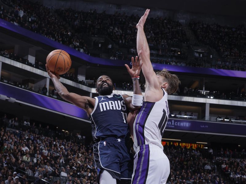 SACRAMENTO, CA - MARCH 29:  Kyrie Irving #11 of the Dallas Mavericks goes to the basket during the game on March 29, 2024 at Golden 1 Center in Sacramento, California. NOTE TO USER: User expressly acknowledges and agrees that, by downloading and or using this Photograph, user is consenting to the terms and conditions of the Getty Images License Agreement. Mandatory Copyright Notice: Copyright 2024 NBAE (Photo by Rocky Widner/NBAE via Getty Images)