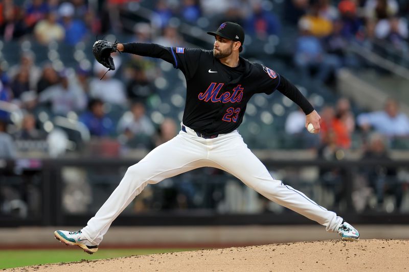 May 30, 2025; New York City, New York, USA; New York Mets starting pitcher David Peterson (23) pitches against the Colorado Rockies during the third inning at Citi Field. Mandatory Credit: Brad Penner-Imagn Images