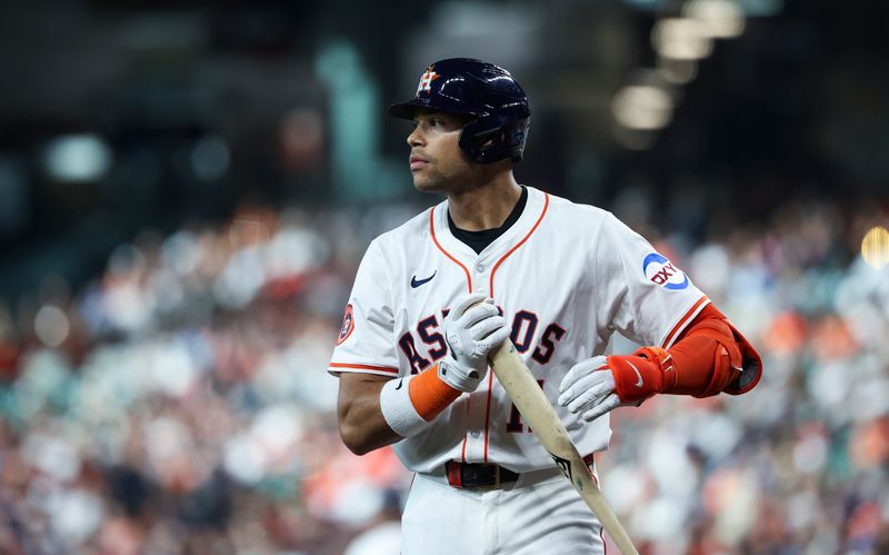 Jul 26, 2025; Houston, Texas, USA; Houston Astros right fielder Cam Smith (11) reacts after a pitch during the game against the Athletics at Daikin Park. Mandatory Credit: Troy Taormina-Imagn Images