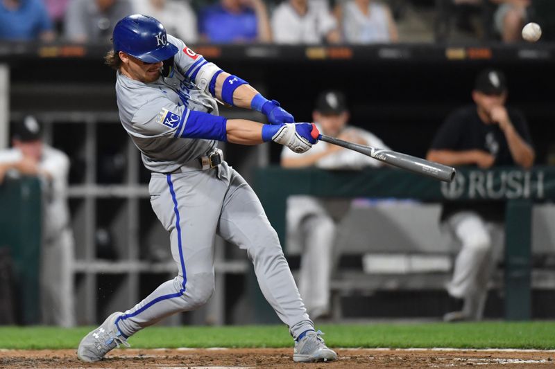 Jul 30, 2024; Chicago, Illinois, USA; Kansas City Royals shortstop Bobby Witt Jr. (7) hits an RBI single during the eighth inning against the Chicago White Sox at Guaranteed Rate Field. Mandatory Credit: Patrick Gorski-USA TODAY Sports