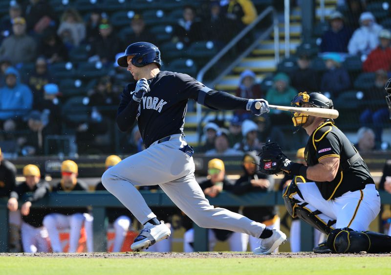 Feb 23, 2026; Bradenton, Florida, USA;  New York Yankees outfielder Max Schuemann (30) singles during the third inning against the Pittsburgh Pirates at LECOM Park. Mandatory Credit: Kim Klement Neitzel-Imagn Images