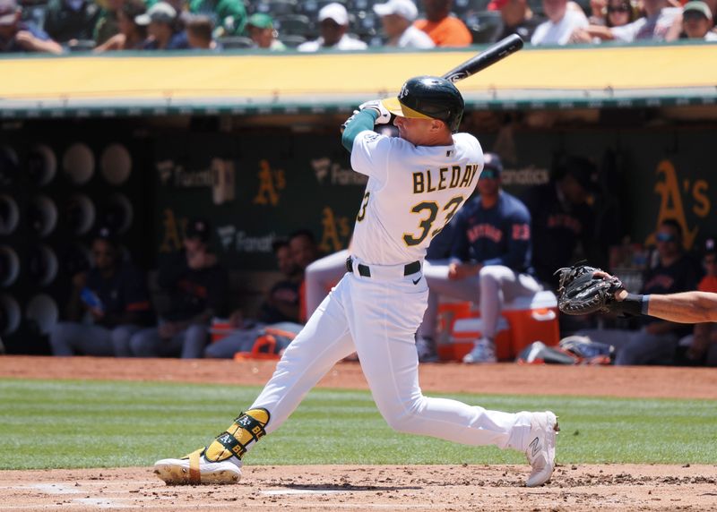 Jul 23, 2023; Oakland, California, USA; Oakland Athletics center fielder JJ Bleday (33) hits a solo home run against the Houston Astros during the first inning at Oakland-Alameda County Coliseum. Mandatory Credit: Kelley L Cox-USA TODAY Sports