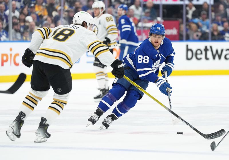 Apr 27, 2024; Toronto, Ontario, CAN; Toronto Maple Leafs right wing William Nylander (88) skates with the puck as Boston Bruins center Pavel Zacha (18) tries to defend during the first period in game four of the first round of the 2024 Stanley Cup Playoffs at Scotiabank Arena. Mandatory Credit: Nick Turchiaro-USA TODAY 