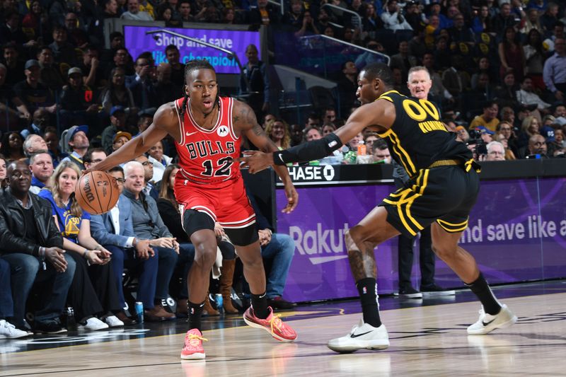 SAN FRANCISCO, CA - MARCH 7: Ayo Dosunmu #12 of the Chicago Bulls handles the ball during the game against the Golden State Warriors on March 7, 2024 at Chase Center in San Francisco, California. NOTE TO USER: User expressly acknowledges and agrees that, by downloading and or using this photograph, user is consenting to the terms and conditions of Getty Images License Agreement. Mandatory Copyright Notice: Copyright 2024 NBAE (Photo by Noah Graham/NBAE via Getty Images)