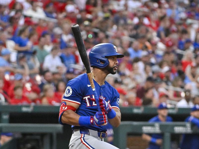 Jul 29, 2024; St. Louis, Missouri, USA;  Texas Rangers center fielder Leody Taveras (3) drives in a run as he grounds out against the St. Louis Cardinals during the fourth inning at Busch Stadium. Mandatory Credit: Jeff Curry-USA TODAY Sports