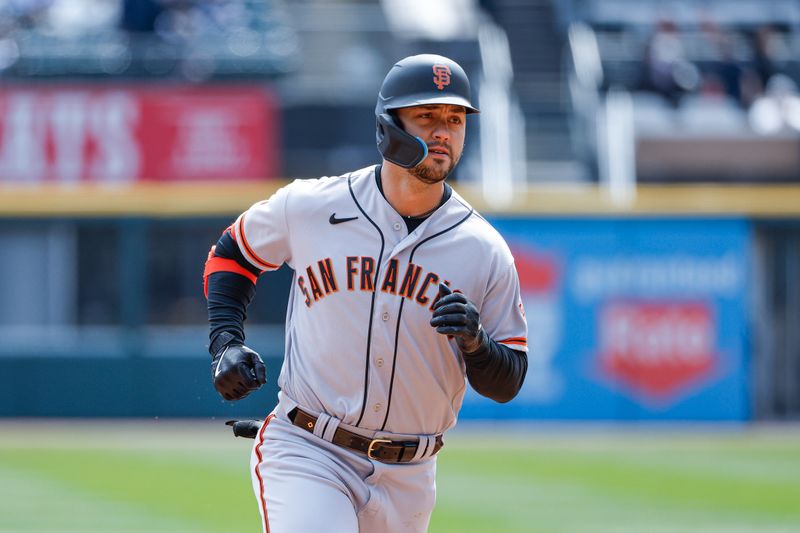 Apr 6, 2023; Chicago, Illinois, USA; San Francisco Giants right fielder Michael Conforto (8) rounds the bases after hitting a three-run home run against the Chicago White Sox during the first inning at Guaranteed Rate Field. Mandatory Credit: Kamil Krzaczynski-USA TODAY Sports