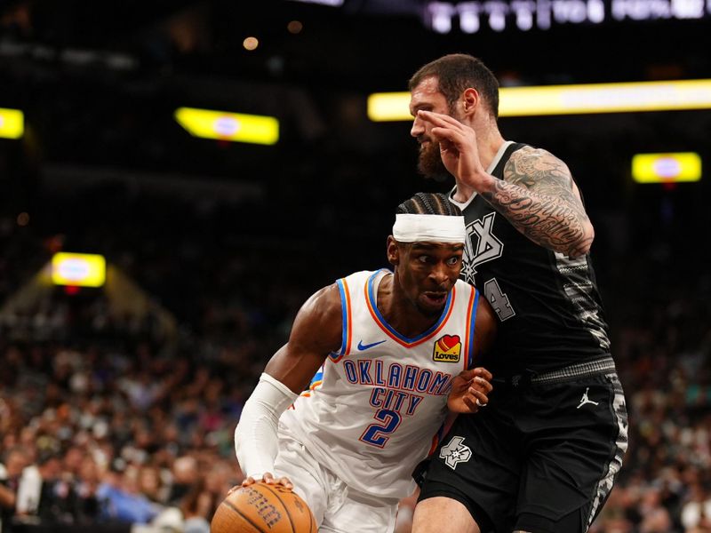 SAN ANTONIO, TX - NOVEMBER 19: Shai Gilgeous-Alexander #2 of the Oklahoma City Thunder drives to the basket during the game against the San Antonio Spurs during the Emirates NBA Cup game on November 19, 2024 at the Frost Bank Center in San Antonio, Texas. NOTE TO USER: User expressly acknowledges and agrees that, by downloading and or using this photograph, user is consenting to the terms and conditions of the Getty Images License Agreement. Mandatory Copyright Notice: Copyright 2024 NBAE (Photos by Darren Carroll/NBAE via Getty Images)