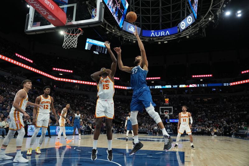 MINNEAPOLIS, MN -  APRIL 12: Rudy Gobert #27 of the Minnesota Timberwolves drives to the basket during the game against the Atlanta Hawks on April 12, 2024 at Target Center in Minneapolis, Minnesota. NOTE TO USER: User expressly acknowledges and agrees that, by downloading and or using this Photograph, user is consenting to the terms and conditions of the Getty Images License Agreement. Mandatory Copyright Notice: Copyright 2024 NBAE (Photo by Jordan Johnson/NBAE via Getty Images)