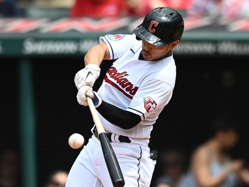 Jul 23, 2023; Cleveland, Ohio, USA; Cleveland Guardians left fielder Steven Kwan (38) hits a single during the fifth inning against the Philadelphia Phillies at Progressive Field. Mandatory Credit: Ken Blaze-USA TODAY Sports