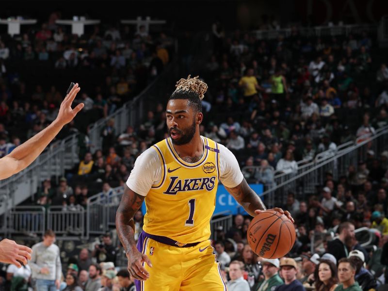 MILWAUKEE, WI - OCTOBER 10: D'Angelo Russell #1 of the Los Angeles Lakers dribbles the ball during the game against the Milwaukee Bucks during a preseason game on October 10, 2024 at Fiserv Forum Center in Milwaukee, Wisconsin. NOTE TO USER: User expressly acknowledges and agrees that, by downloading and or using this Photograph, user is consenting to the terms and conditions of the Getty Images License Agreement. Mandatory Copyright Notice: Copyright 2024 NBAE (Photo by Gary Dineen/NBAE via Getty Images).