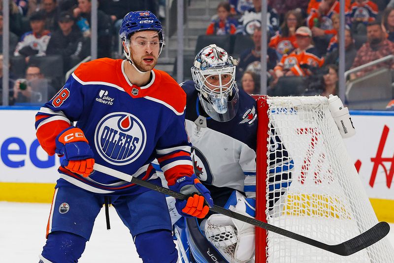Sep 26, 2025; Edmonton, Alberta, CAN; Edmonton Oilers forward Andrew Mangiapane (88) looks for a pass in front of Winnipeg Jets goaltender Domenic DiVincentiis (50) during the first period at Rogers Place. Mandatory Credit: Perry Nelson-Imagn Images